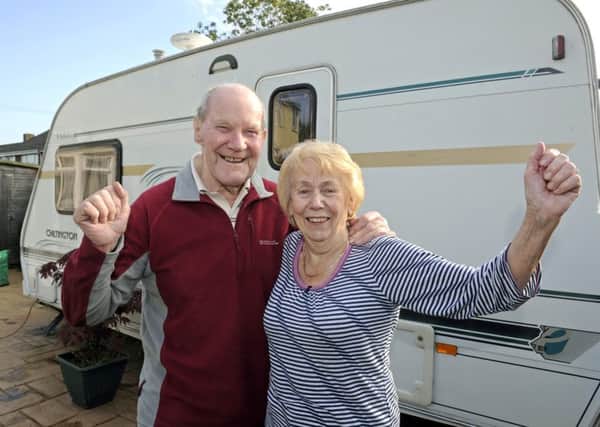 David and Dorothy Simmonds from Fareham celebrate after the News helped them to get their Saga caravan insurance sorted out in 2014.
Picture: Ian Hargreaves (141137-3)