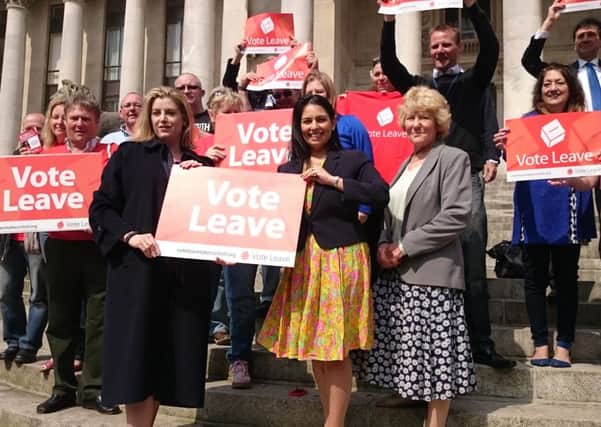 Portsmouth MP Penny Mordaunt with employment minister Priti Patel and Vote Leave supporters on the steps of Portsmouth Guildhall