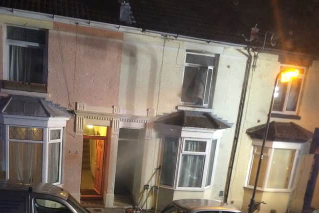 BLAZE The property - with smoke billowing out - in Eastneys Adair Road