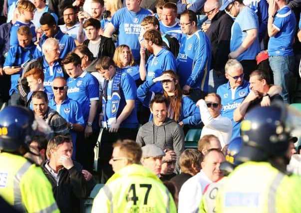 Dejected Pompey fans after defeat to Plymouth     Picture: Joe Pepler