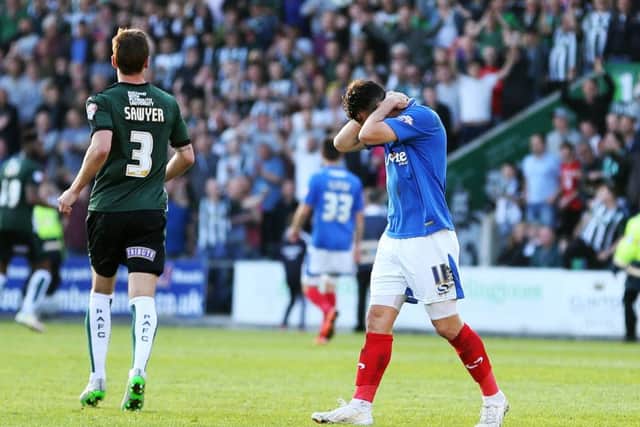 Gary Roberts shows his frustration at the final whistle. Picture: Joe Pepler