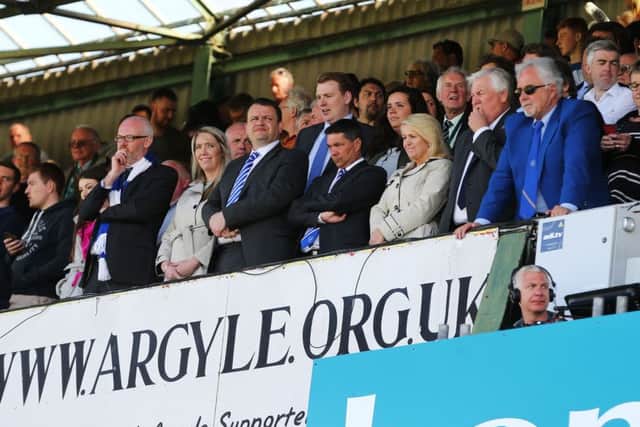 Pompey chairman Iain McInnes, right, with the rest of the Pompey board at Home Park last night Picture: Joe Pepler
