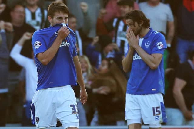 Ben Close and Adam Barton take in the defeat at Home Park Picture: Joe Pepler