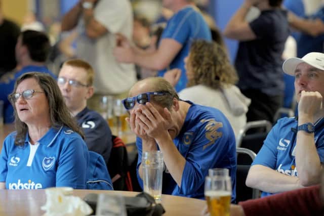 15/5/16
Pompey fans watch the match against Plymouth on big screens at the Victory Bar at Fratton Park. L-R Amanda Wallis, Steve Johnson, Michael Toomer.
Picture: Paul Jacobs (160254-9) PPP-160515-212926006