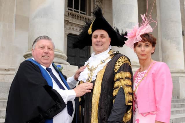From left, outgoing Lord Mayor of Portsmouth Frank Jonas with newly-elected David Fuller and his sister and Lady Mayoress of Portsmouth Leza Tremorin
Picture: Sarah Standing (160725-9115)