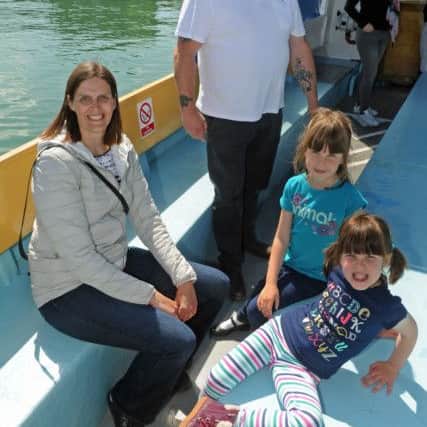 Skipper Edward Tiller ran the water taxi and met customers Victoria Boscaro and her children Monica and Charlotte 
Picture: Ian Hargreaves (160695-1)