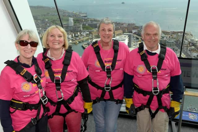15/5/16Sponsored abseil at the Spinnaker Tower for Brain Tumour Research. L-R Ruth Parke, Debbie Pearce, Stephanie Treadwell and Derek Reynolds Picture: Paul Jacobs (160253-6) PPP-160515-163523006