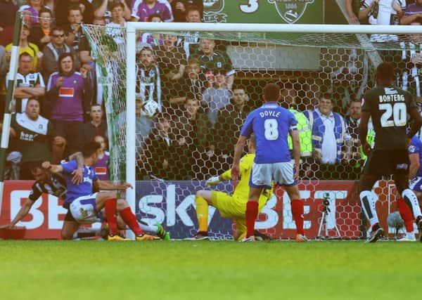 Peter Hartley's last-gasp effort finds its way into the Pompey net Picture: Joe Pepler