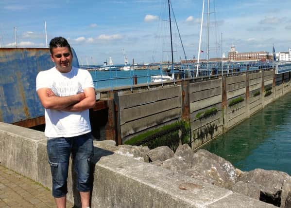 Cab driver Yavuz Eryilmaz, 28, from Gosport, who leapt into the water to rescue a woman