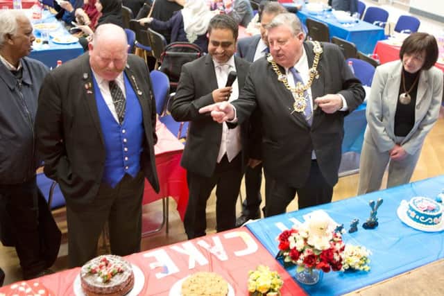 Former city Lord Mayor Cllr Frank Jonas judges the cakes Pictures: Habibur Rahman