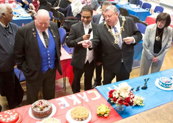 Former city Lord Mayor Cllr Frank Jonas judges the cakes Pictures: Habibur Rahman