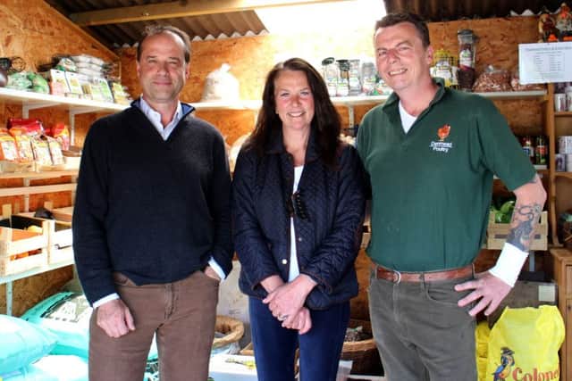 Meon Valley MP George Hollingbery with Andy and Karen Rafferty from Denmead Poultry