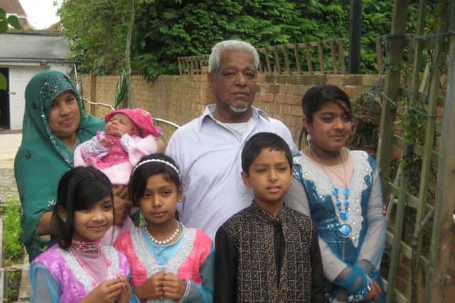 Former Portsmouth resident Mohammed Abdul Kaeum Esquire with his wife, grandson and granddaughters, in a picture taken on Eid festival in 2012