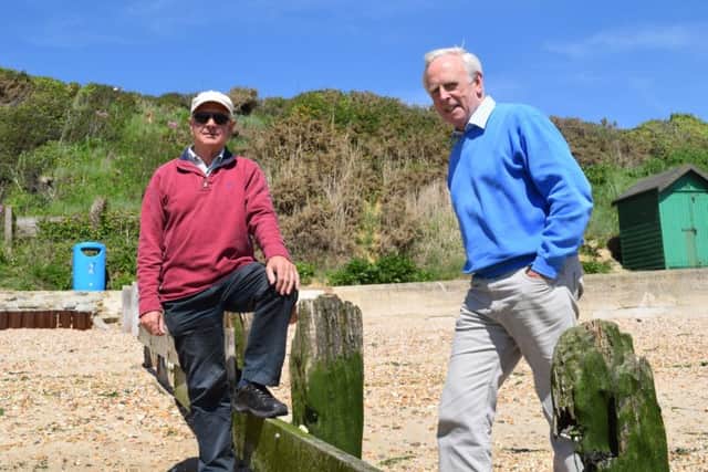 Beach hut owner Tony Pepper of Old Street, Hill Head, left, with Bill Hutchinson of the Hill Head Residents Association at the Hill Head sea wall
Picture: Loughlan Campbell