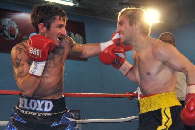 Floyd Moore, left, was stopped in the ninth round he when fought Yordan Vasilev in 2013 Picture: Mick Young