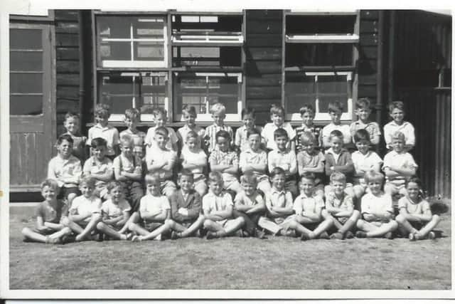 Class A1 at Hillside Junior Schoo, Paulsgrove in 1959. Fifth from the right in the front row is Bobby Stokes.