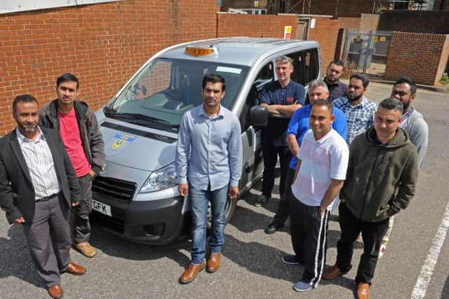 From left, Abdul Haque, Mohammad Choudry, Faizul Fahim, Russell Crewe, Fa Mahud, Mark Stone, Shahiul Islam, Nizam Ahmed, Ohibur Rahman, Mohammad Alam Picture Ian Hargreaves (160697-1)