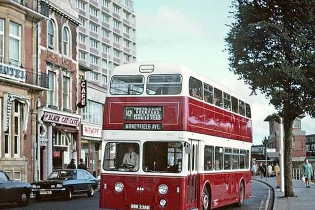 How many of you remember catching the 143C to Moneyfields Avenue? This bus is passing through The Hard towards the dockyard gates.