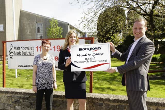 yBloor Homes sales advisor Jurgita Jeruseviciene (centre) with Anne Morgan and Chris Gadd from the Waterlooville Music Festival organising committee outside St Georges Church
Picture: Charlie Davies Photograph