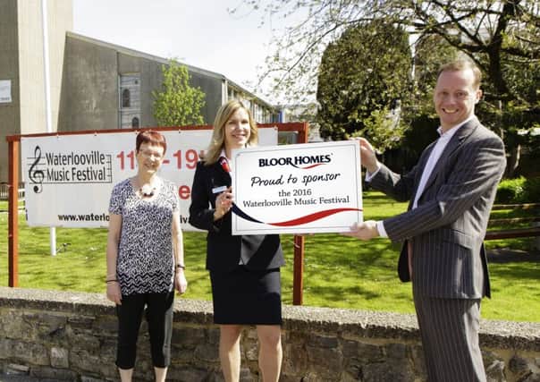 y

Bloor Homes sales advisor Jurgita Jeruseviciene (centre) with Anne Morgan and Chris Gadd from the Waterlooville Music Festival organising committee outside St Georges Church
Picture: Charlie Davies Photograph