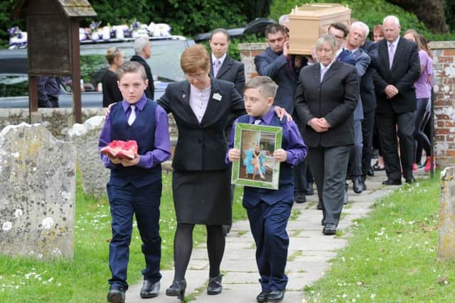 A picture of Lisa Calladine and her trainers were among the tributes at her funeral