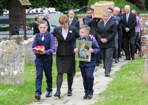 A picture of Lisa Calladine and her trainers were among the tributes at her funeral