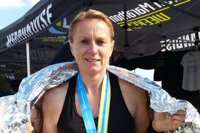 Lisa Calladine at the end of the Brighton marathon