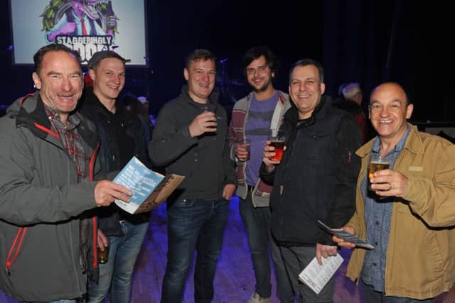 Punters enjoy the wide variety of ales on offer at the Portsmouth Beer Festival, held inside Portsmouth Guildhall.
(160702-3)