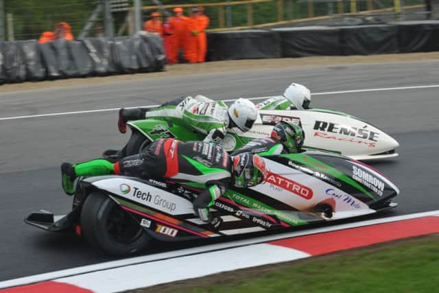 Ricky Stevens and Ryan Charlwood, front, bid to overtake British Formula One sidecar championship title rivals Tim Reeves and Greg Cluze at Brands Hatch Picture: John Mushet