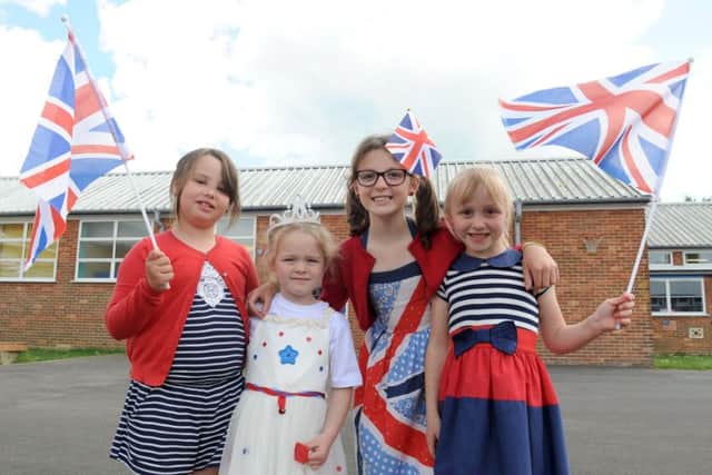 Truly Gander, eight, Briony Long, four, Evie Rose, eight, and Emily Taylor,. six, from Bedenham Primary School Picture: Sarah Standing (160736-113)