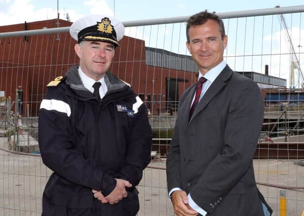 Portsmouth Naval Base Commander Commodore Jeremy Rigby with Mark Lancaster, the minister for defence personnel and Veterans Picture: LA(Phot) Nicky Wilson