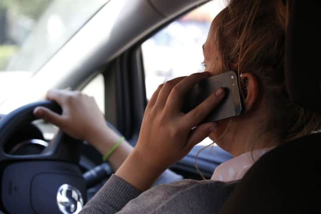 Police have launched a campaign against people using phones at the wheel