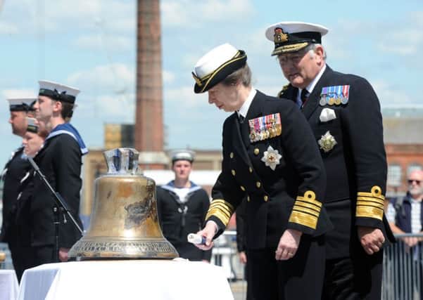 Princess Anne rings the bell of HMS Hood in Portsmouth today  

Picture: Sarah Standing (160737-888)