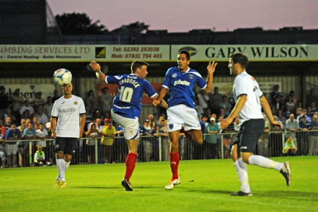 Romain Padovani, centre right, scores for Pompey in a 5-0 win over the Hawks in 2013 Picture: Ian Hargreaves
