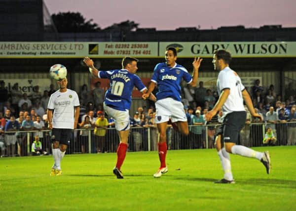 Romain Padovani, centre right, scores for Pompey in a 5-0 win over the Hawks in 2013    Picture: Ian Hargreaves