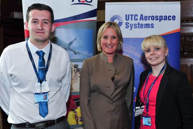Apprentices Natalie May and George Holloway from Stubbington with centre Gosport MP Caroline Dinenage at parliament