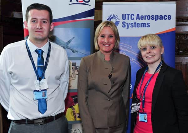 Apprentices Natalie May and George Holloway from Stubbington with centre Gosport MP Caroline Dinenage at parliament