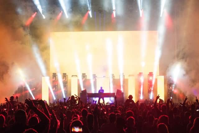 Steve Angello wows the crowd with his music, light and effects show. Picture: Keith Woodland