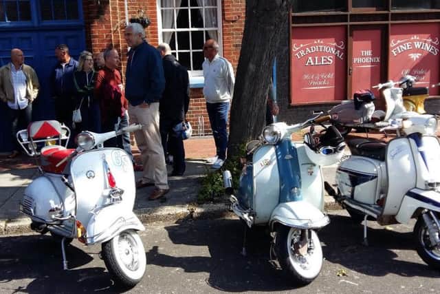 Scooters lined up outside The Phoenix pub in North End ahead of the charity ride for Natalie Turner