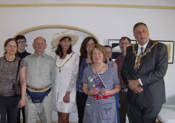 The Lord Mayor of Portsmouth David Fuller and Lady Mayoress Leza Tremorin with author Katy Hounsell-Robert and members of her family