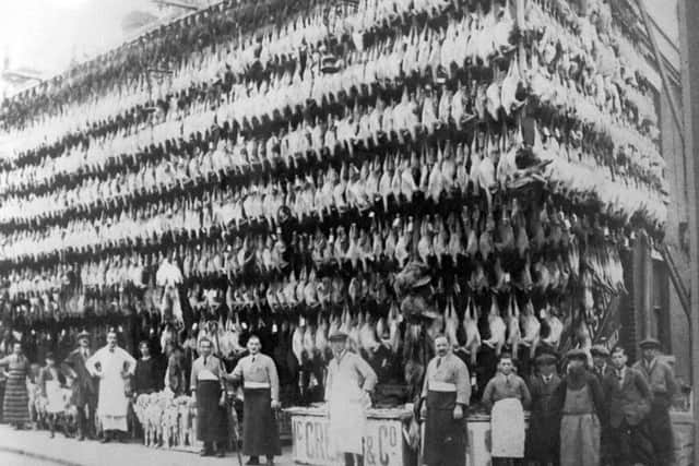 POULTRY Hundreds of chickens and turkeys on display at a Portsmouth butchers