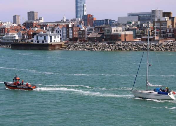 GAFIRS takes a Bavaria yacht under tow into Portsmouth Harbour on Sunday, May 29, 2016 Picture: Beverley Haggard, Gosport NCI