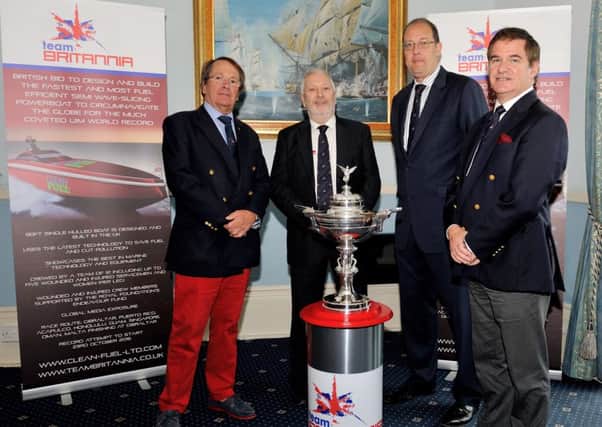 Alan Priddy, second left, from Team Britannia with the Dupree International Challenge Trophy alongside Commodore Miles Linington, Adrian Saunders and Squadron Leader Simon Wright-Cooper, Secretary at the Royal Naval Club & Royal Albert Yacht Club.   Photo: Chris Davies/Team Britannia