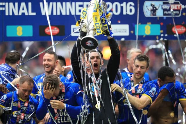 AFC Wimbledon celebrate promotion via the play-offs