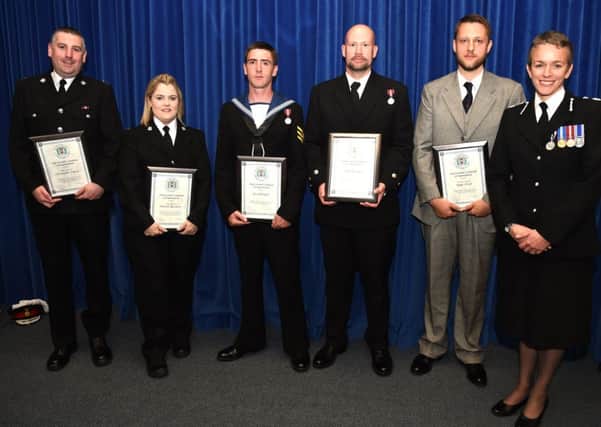 PC Chris Dawes, Sgt Danielle Ruzewicz, Roy Bebington, Chad Newman, DS Roger Wood and chief constable Olivia Pinkney Picture: Jan Brayley/Hampshire police