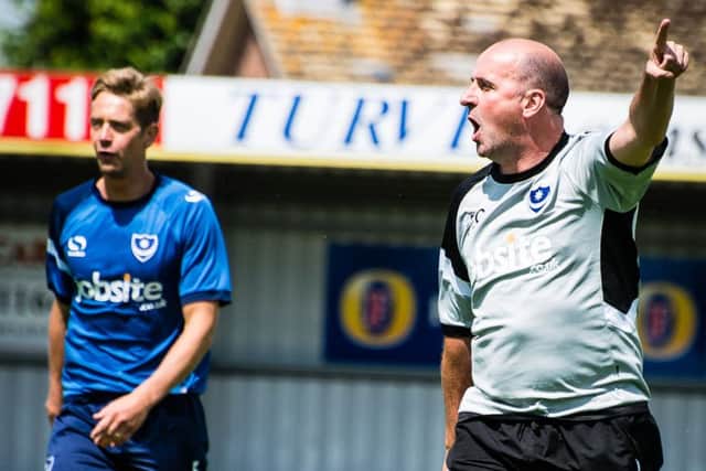 Paul Robinson, left, with Pompey boss Paul Cook during pre-season training last summer Picture: Joe Pepler
