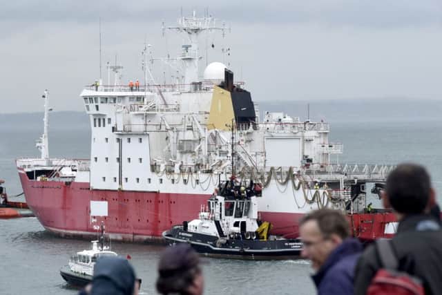 HMS Endurance being towed out of Portsmouth this afternoon Picture: Tom Harrison/ Solent News & Photo Agency