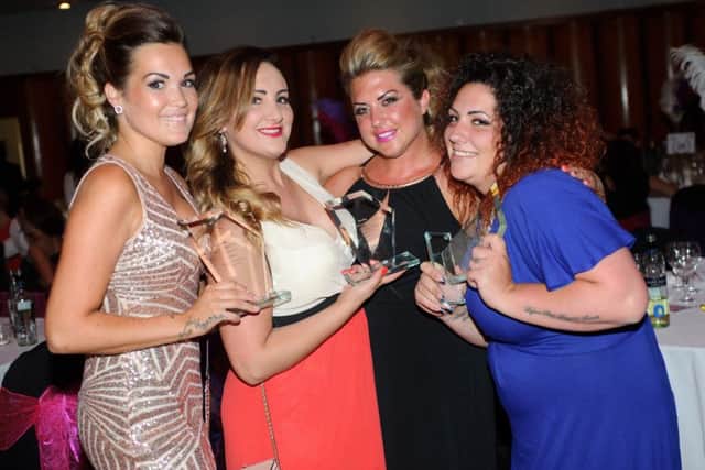 Rebecca Gibbons, from Diamond Quay Hair and Beauty Lounge. The winner of Beauty Therapist of the Year. (in red) Stephanie Jones, from Diamond Quay Hair and Beauty Lounge, runner up of the Colour Technician of the Year award. Erin Searle, from Diamond Quay Hair and Beauty Lounge, the winner of Nail Technician of the Year 2015  Picture: Allan Hutchings (151139-303)