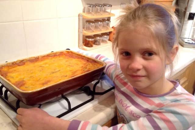 Sophie Janes, seven, with her cottage pie