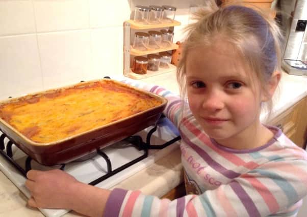 Sophie Janes, seven, with her cottage pie